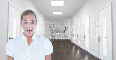Businesswoman screaming while standing at hallway