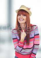 Portrait of happy female hipster wearing sweater