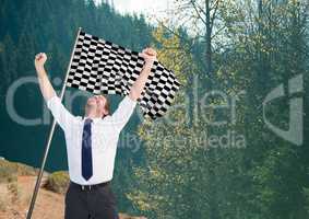 businesman with checker flag in the mountain