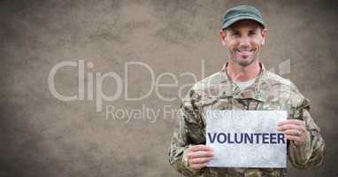 Soldier volunteer against brown background with grunge overlay