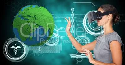Businesswoman wearing VR glasses while touching low poly earth
