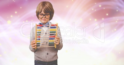 Boy looking at abacus over bokeh