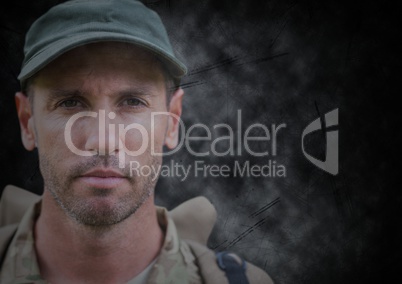 Transparent soldier face against black grunge background