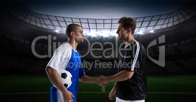 Soccer players shaking hands before match