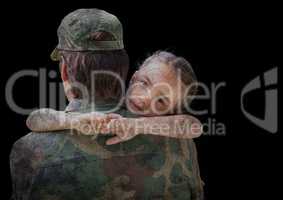 Back of soldier with daughter against black background with grunge overlay