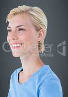 Close up profile of woman smiling against grey background