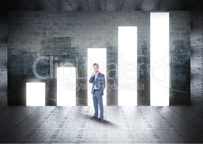 Businessman standing against doorway in bar graph shape