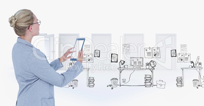 Businesswoman using tablet PC with graphics in background