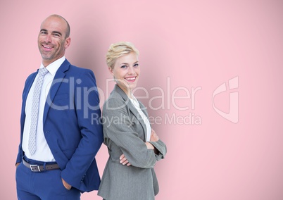 Portrait of smiling business people standing against pink background