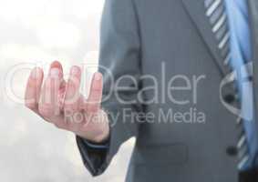 Midsection of businessman gesturing