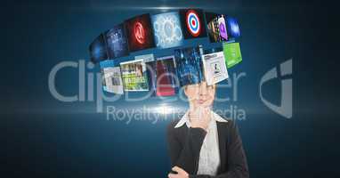 Businesswoman looking at panels flying over head