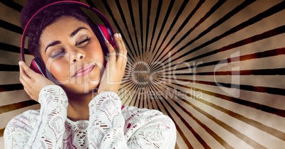 Young woman enjoying music on headphones