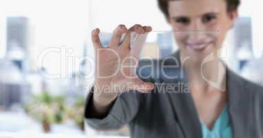Businesswoman holding transparent device