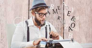 Hipster holding smoking pipe while using typewriter