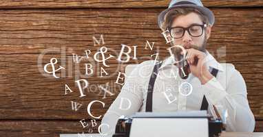 Hippie businessman smoking pipe while using type writer