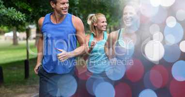 Happy people jogging in park