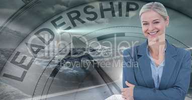 Smiling businesswoman against leadership clock
