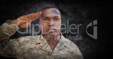 Soldier saluting with black grunge background and overlay