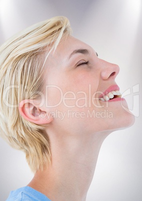 Close up profile of woman eyes closed against white background