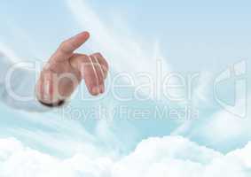 Hand of God in cloudy heavenly sky