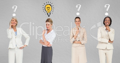 Businesswomen with light bulb and question marks