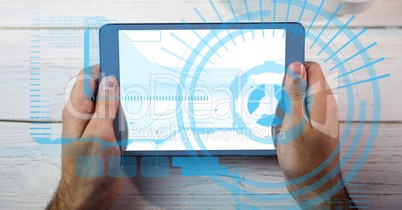 Digital composite image of hands holding tablet PC