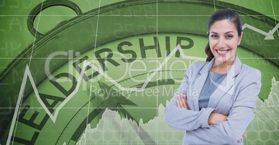 Confident businesswoman with arms crossed against leadership clock