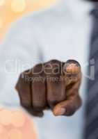 Close-up of businessman pointing with focus on finger