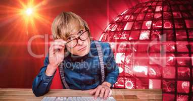 Male hacker wearing eyeglasses against globe