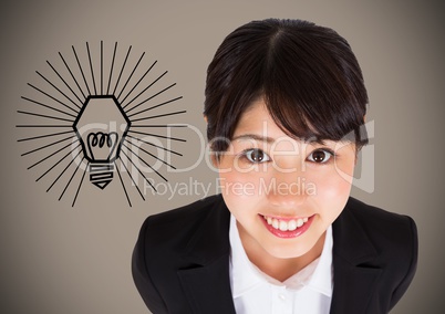 Business woman looking up against lightbulb graphic and brown background