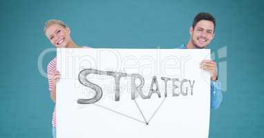 Friends holding billboard with strategy text while standing against green background