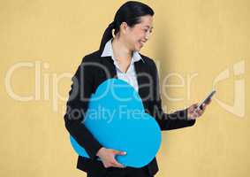 Happy businesswoman holding cloud while using smart phone