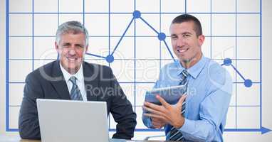 Businessmen smiling while using technologies against graph