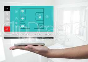 Hand holding a tablet and Home automation system App Interface