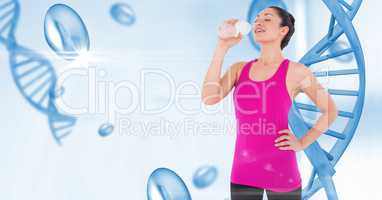 Healthy woman drinking water against DNA structures