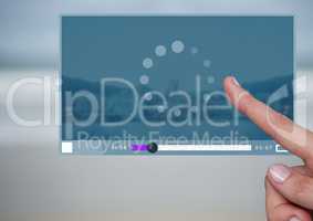 Hand touching Video Player App Interface