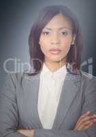 Close up of business woman arms folded against navy background