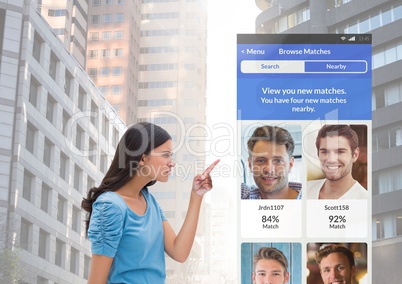 Woman pointing at a Dating App Interface with men profiles