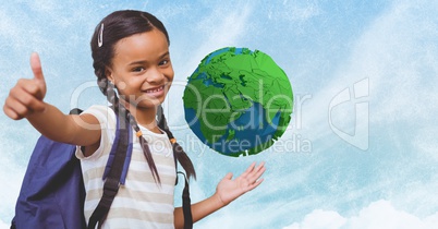 Smiling girl showing thumb up with low poly earth in background