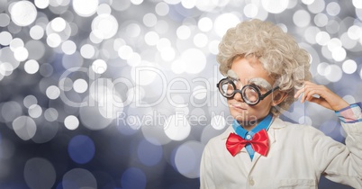 Thoughtful boy pretending as scientist against bokeh