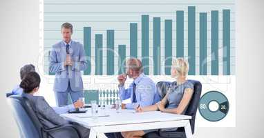 Business people having discussing with graph in background