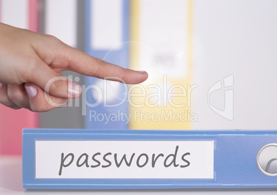 Hand pointing in air over passwords folder