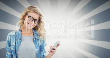 Female hipster holding smart phone against bright background