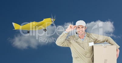 Delivery man carrying parcel against 3d plane