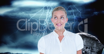 Smiling businesswoman against thunderstorm