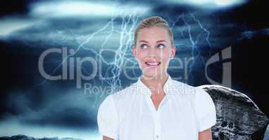 Smiling businesswoman against thunderstorm
