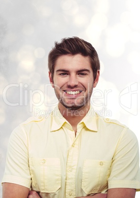 Young man smiling over blur background
