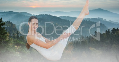Double exposure of woman exercising against mountains