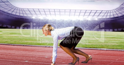 Side view of businesswoman on running tracks