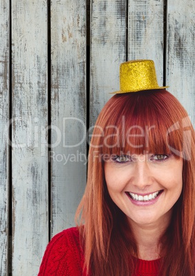 Happy redhead female wearing small hat